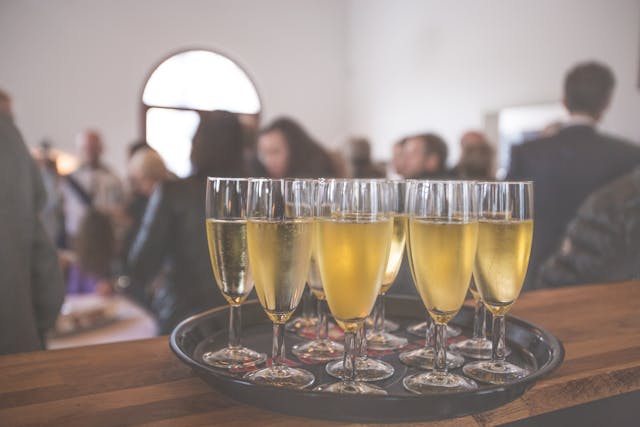 glasses on a tray at an event