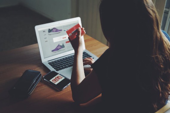 woman shopping for footwear online
