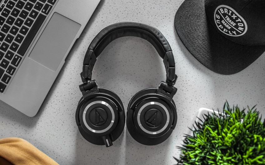 Black Wireless Headphones On White Table