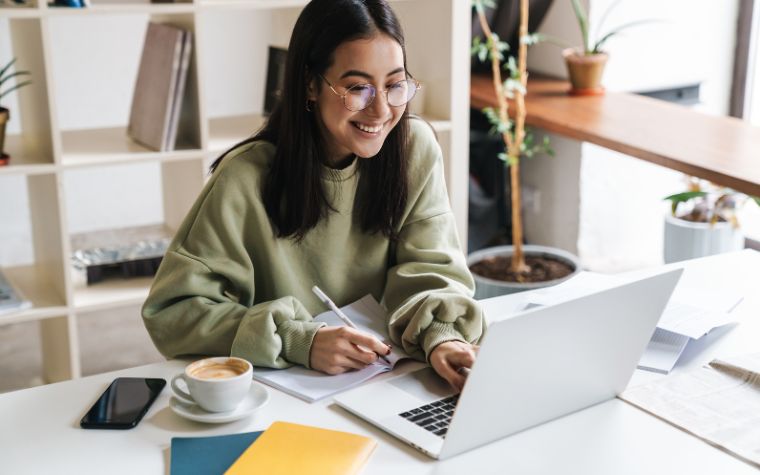 person on her computer doing search