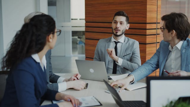 team collaborating in a modern office meeting
