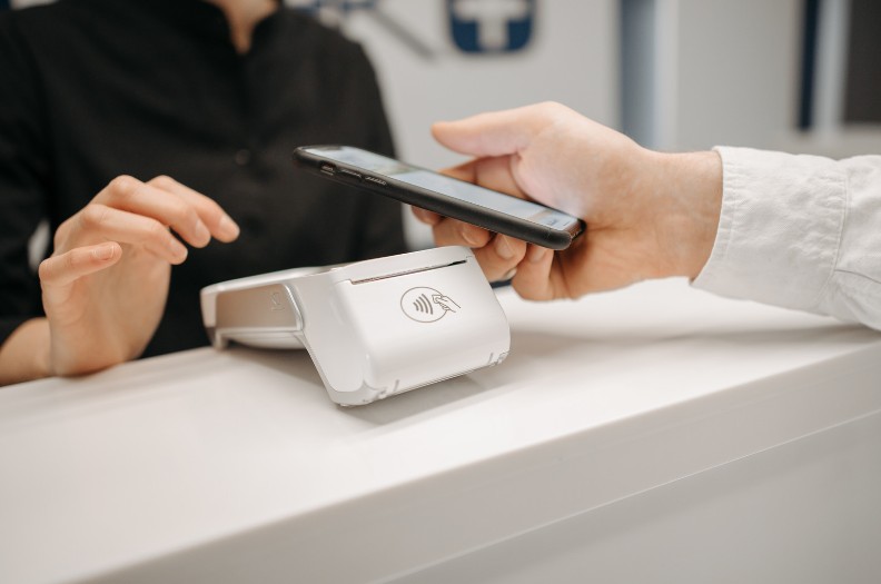 person making a payment with a smartphone